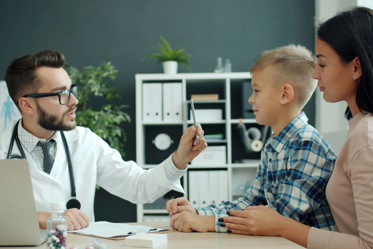 Client and his mother meeting with doctor